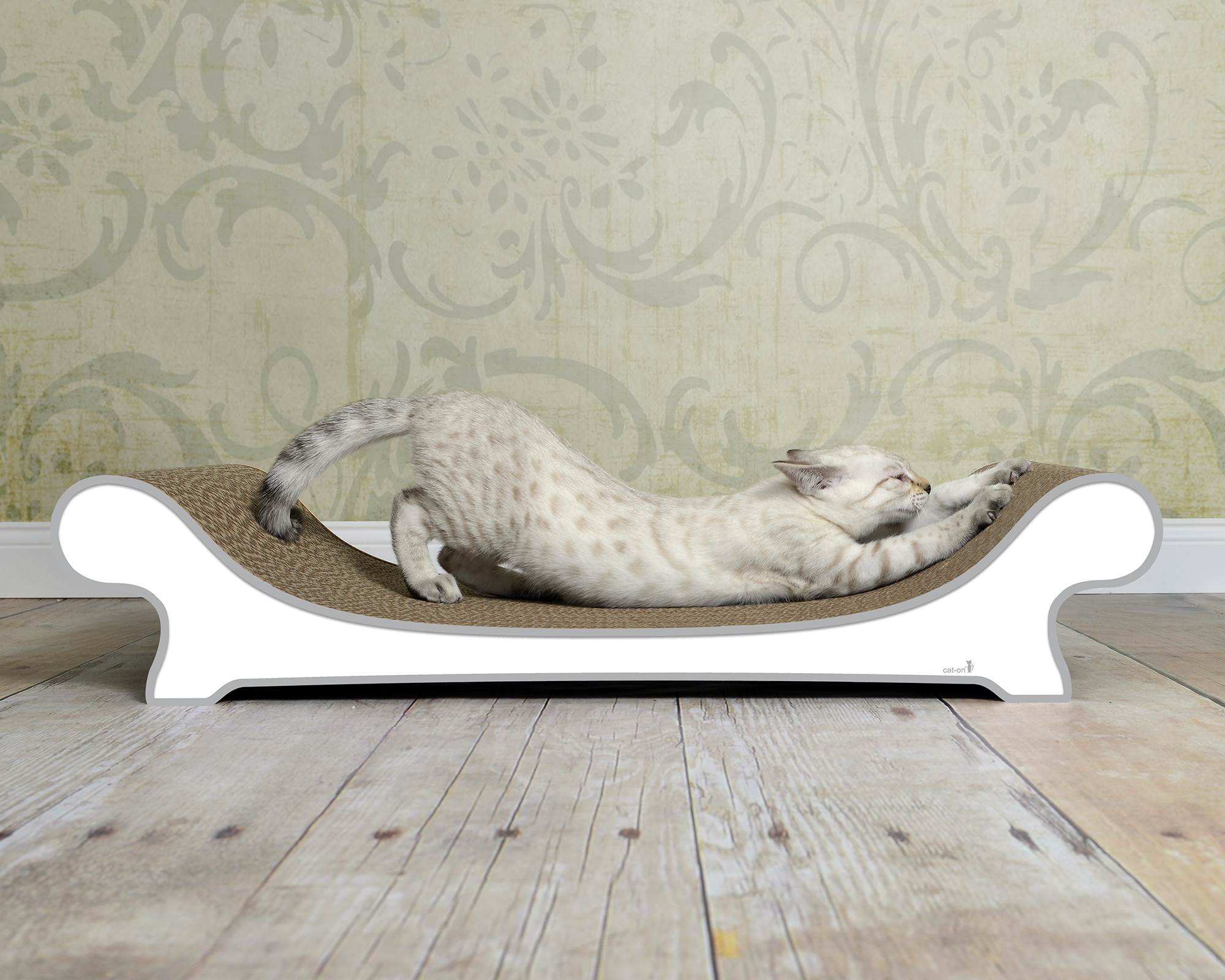 LE CANAPÉ PLUS cat sofa by cat-on, with cat resting on top